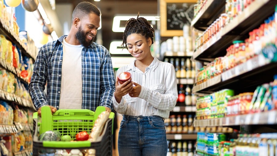 African,Family,Buying,Food,In,Supermarket,Shop,Walking,Pushing,Cart